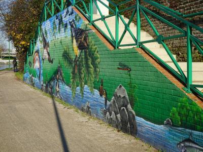 Photo de la fresque d'IKSTE réalisée sur un des escaliers de la voie verte en bord de Deûle © Ville de La Madeleine